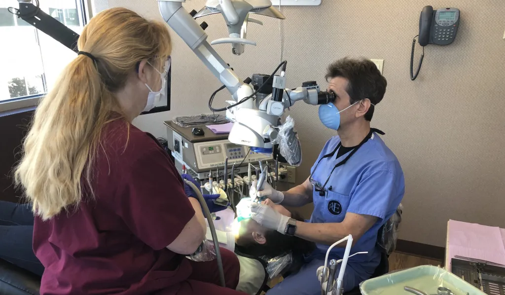 Dr. Nasser working on dental patient