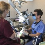 Dr. Nasser working on dental patient