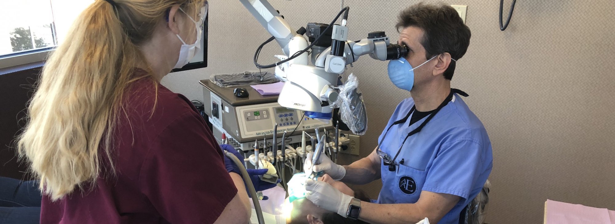 Dr. Nasser working on dental patient